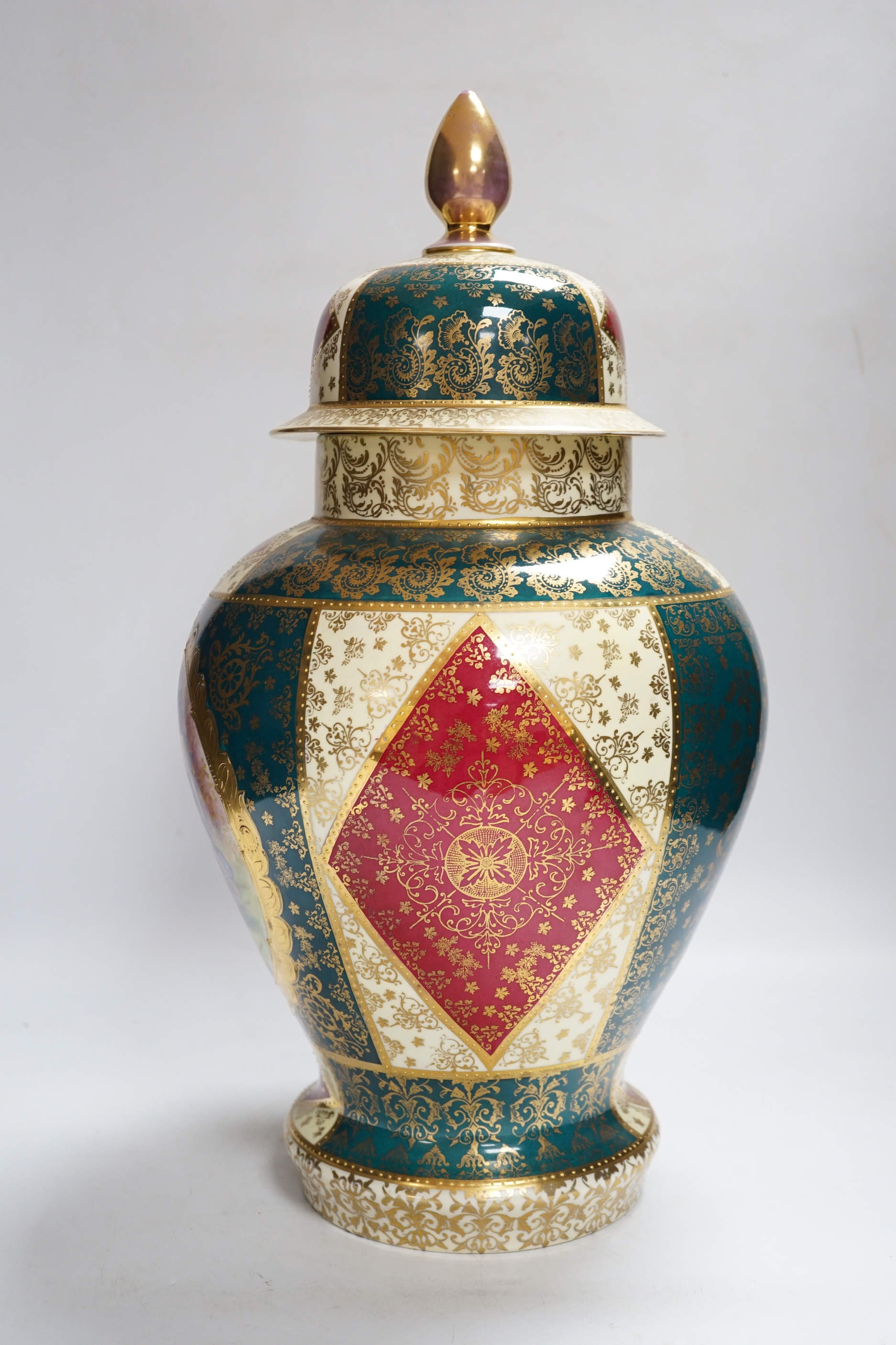 A Vienna style porcelain vase and cover, 43cm